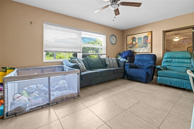 10229 Gulfstream Blvd, Englewood, FL 34224 - living room with a ceiling fan and tile patterned flooring
