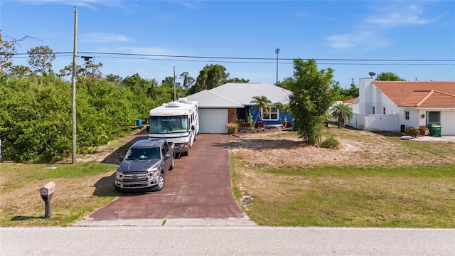 10229 Gulfstream Blvd, Englewood, FL 34224 - view of front of property featuring asphalt driveway