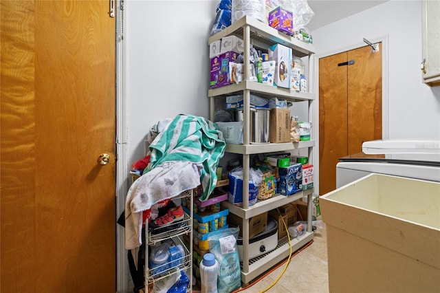 10229 Gulfstream Blvd, Englewood, FL 34224 - storage room featuring washing machine and clothes dryer