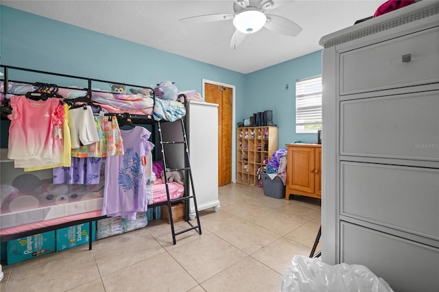 10229 Gulfstream Blvd, Englewood, FL 34224 - tiled bedroom featuring ceiling fan