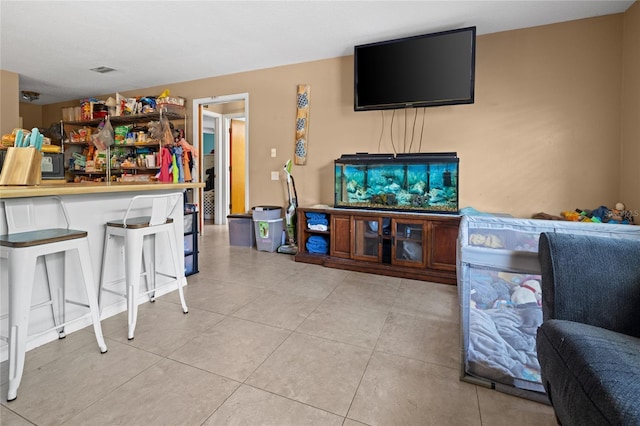 10229 Gulfstream Blvd, Englewood, FL 34224 - living room with light tile patterned flooring