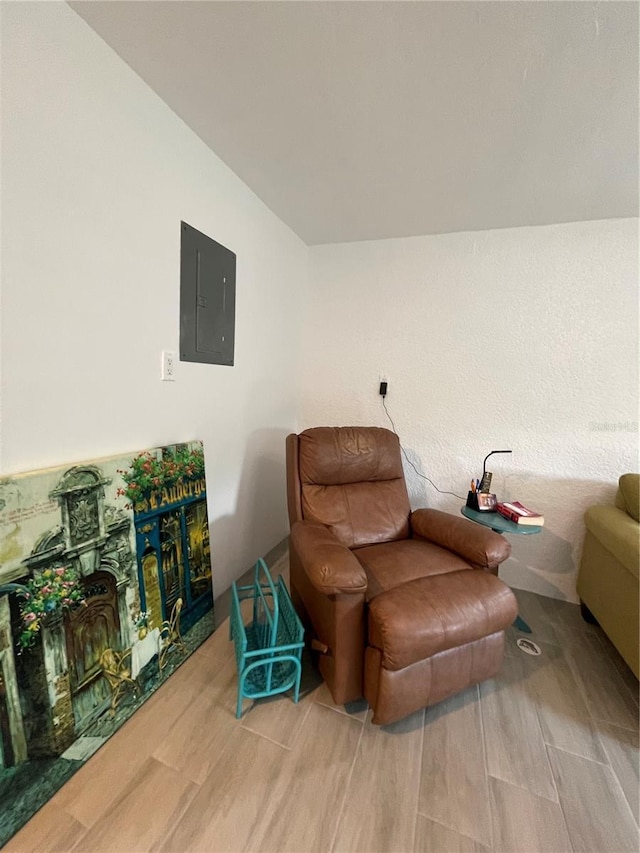 5727 Beechwood St, Punta Gorda, FL 33982 - living area featuring electric panel and wood finished floors