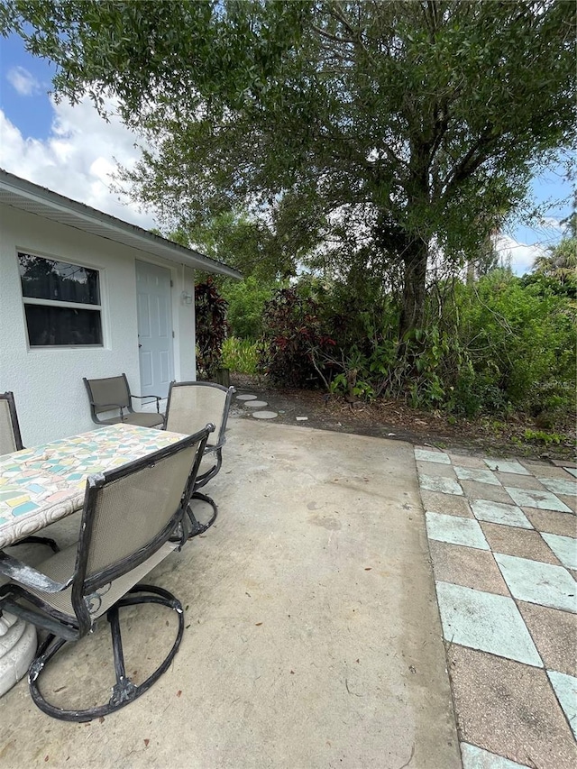 5727 Beechwood St, Punta Gorda, FL 33982 - view of patio / terrace featuring outdoor dining area