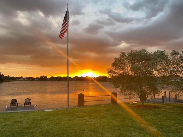 5727 Beechwood St, Punta Gorda, FL 33982 - dock area with a water view and a yard