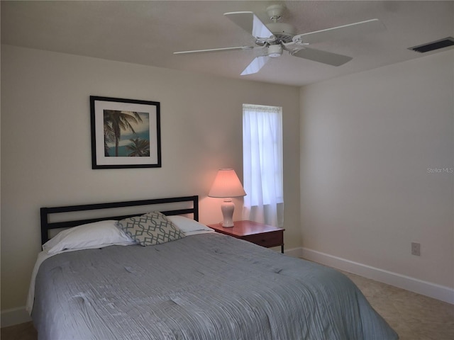 9986 SW Riverview Cir, Arcadia, FL 34269 - bedroom featuring baseboards and ceiling fan
