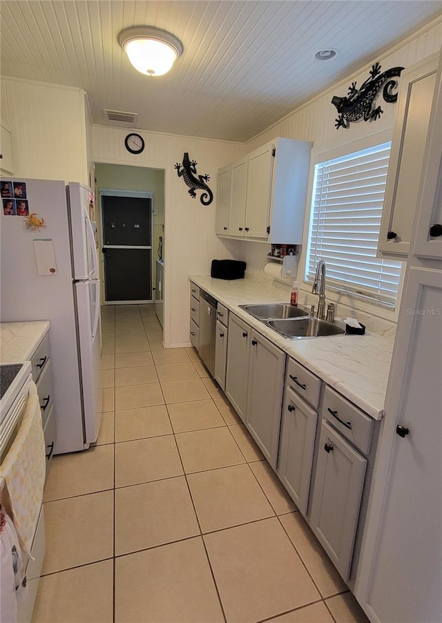 13366 Ballon Ave, Port Charlotte, FL 33981 - kitchen with white appliances, a sink, light tile patterned floors, gray cabinets, and wooden ceiling