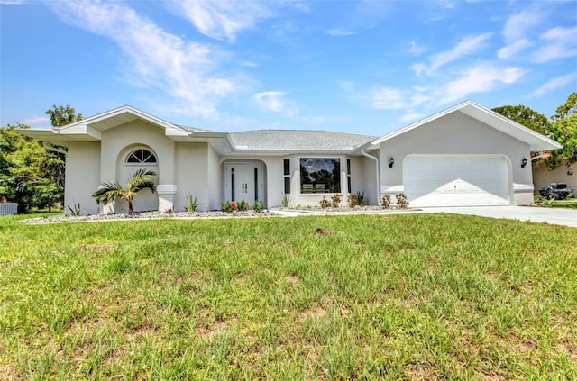 229 Waterside St, Port Charlotte, FL 33954 - single story home with an attached garage, stucco siding, concrete driveway, and a front lawn
