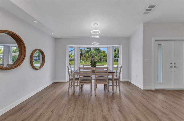 229 Waterside St, Port Charlotte, FL 33954 - dining space with light wood-style flooring