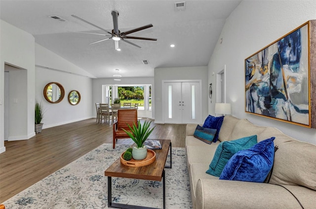 229 Waterside St, Port Charlotte, FL 33954 - living room featuring vaulted ceiling, wood finished floors, a ceiling fan, and recessed lighting
