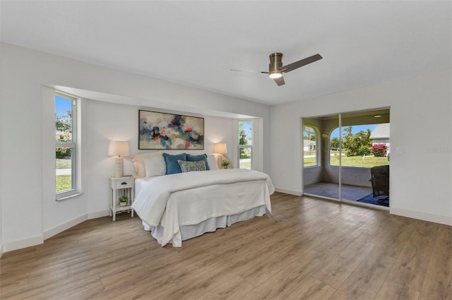 229 Waterside St, Port Charlotte, FL 33954 - bedroom featuring light wood finished floors, access to outside, and a ceiling fan
