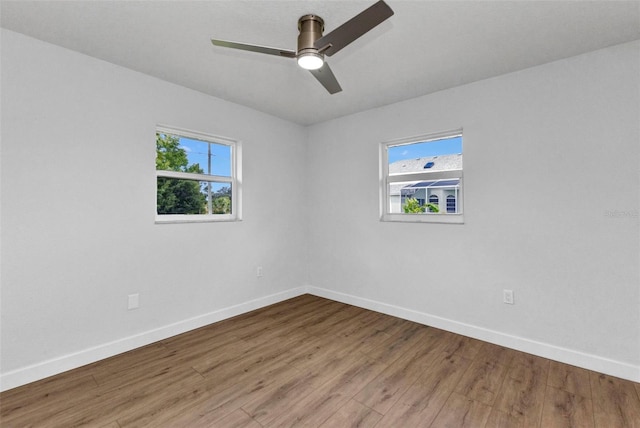 229 Waterside St, Port Charlotte, FL 33954 - empty room featuring wood finished floors and ceiling fan