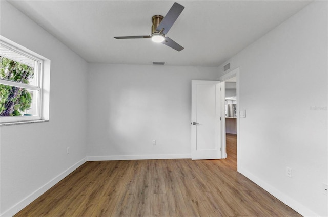 229 Waterside St, Port Charlotte, FL 33954 - spare room with wood finished floors and ceiling fan