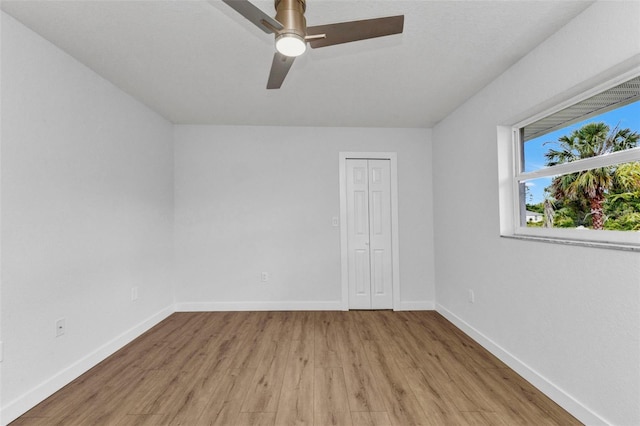229 Waterside St, Port Charlotte, FL 33954 - spare room featuring light wood finished floors and ceiling fan