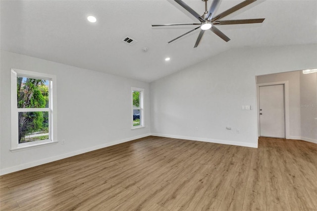 229 Waterside St, Port Charlotte, FL 33954 - unfurnished room with lofted ceiling, light wood-type flooring, a ceiling fan, and recessed lighting