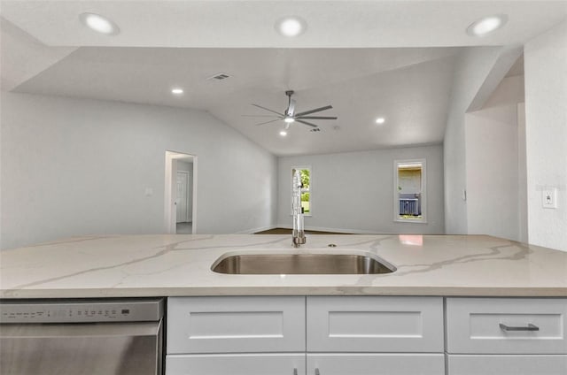 229 Waterside St, Port Charlotte, FL 33954 - kitchen featuring stainless steel dishwasher, white cabinets, light stone counters, lofted ceiling, and ceiling fan