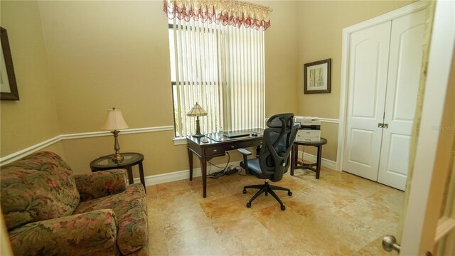 6057 Calusa Ridge Trl, Bokeelia, FL 33922 - office area with baseboards