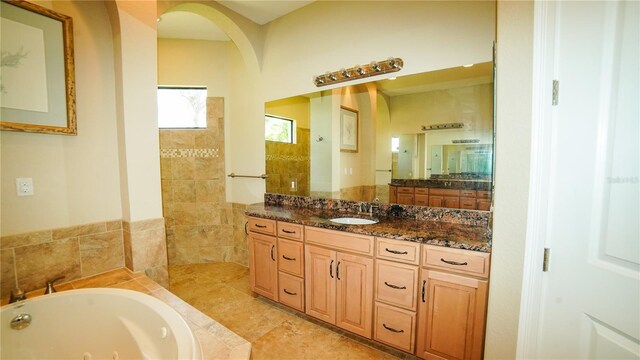 6057 Calusa Ridge Trl, Bokeelia, FL 33922 - full bathroom with a tub with jets, vanity, and a walk in shower