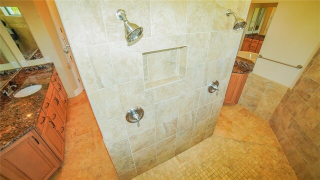 6057 Calusa Ridge Trl, Bokeelia, FL 33922 - bathroom featuring tiled shower and vanity