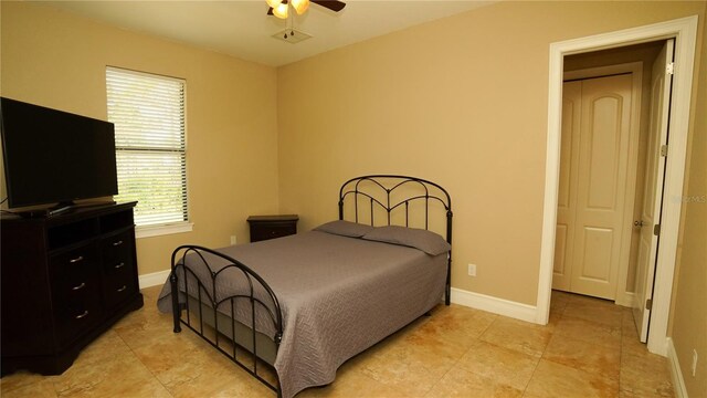 6057 Calusa Ridge Trl, Bokeelia, FL 33922 - bedroom with baseboards and a ceiling fan