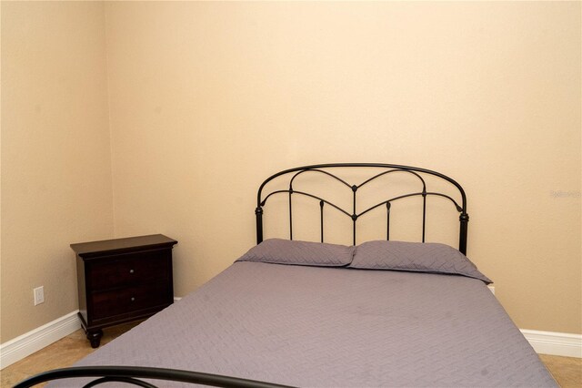 6057 Calusa Ridge Trl, Bokeelia, FL 33922 - bedroom with baseboards