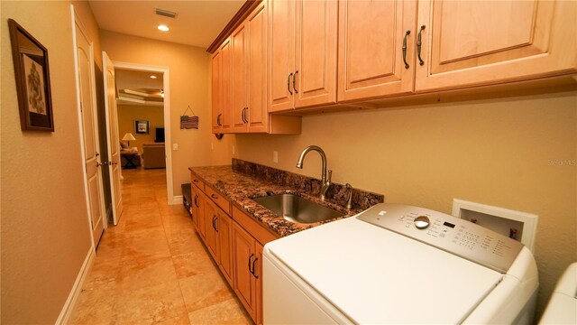 6057 Calusa Ridge Trl, Bokeelia, FL 33922 - washroom featuring washer / dryer, cabinet space, recessed lighting, and baseboards