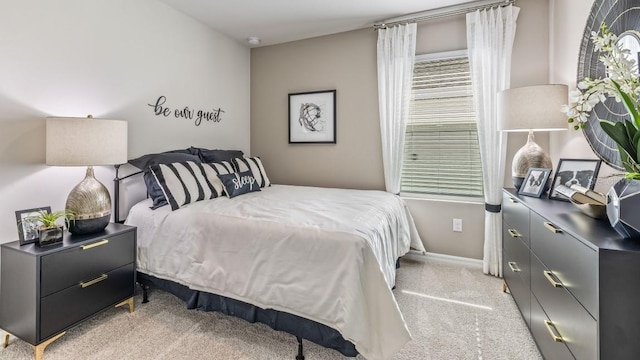 9710 Sand Dune Ln, Punta Gorda, FL 33950 - bedroom with light carpet and baseboards