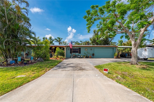 611 Bonita Ct, Punta Gorda, FL 33950 - single story home featuring a front lawn, an attached garage, and driveway