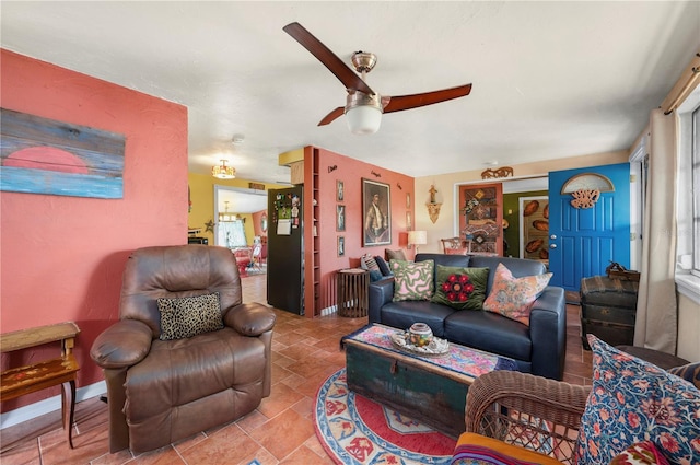 611 Bonita Ct, Punta Gorda, FL 33950 - living room with ceiling fan and light stone finish flooring