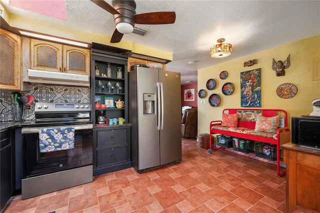 611 Bonita Ct, Punta Gorda, FL 33950 - kitchen featuring appliances with stainless steel finishes, under cabinet range hood, a ceiling fan, stone finish flooring, and open shelves