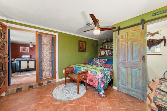 611 Bonita Ct, Punta Gorda, FL 33950 - bedroom with ornamental molding, tile patterned floors, a barn door, baseboards, and ceiling fan