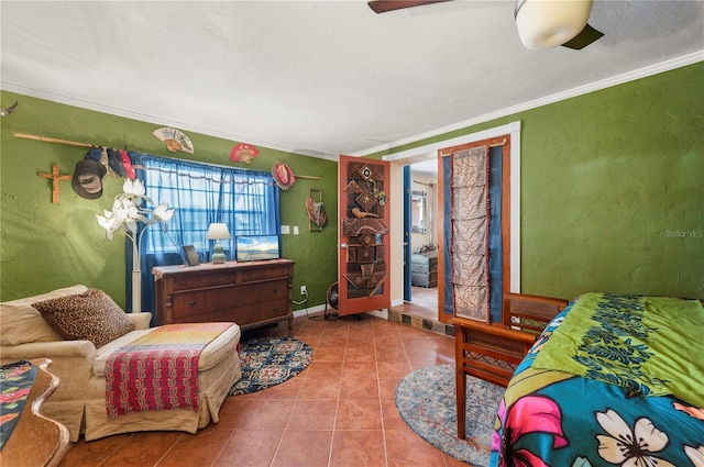 611 Bonita Ct, Punta Gorda, FL 33950 - bedroom featuring tile patterned flooring, ornamental molding, and a textured wall