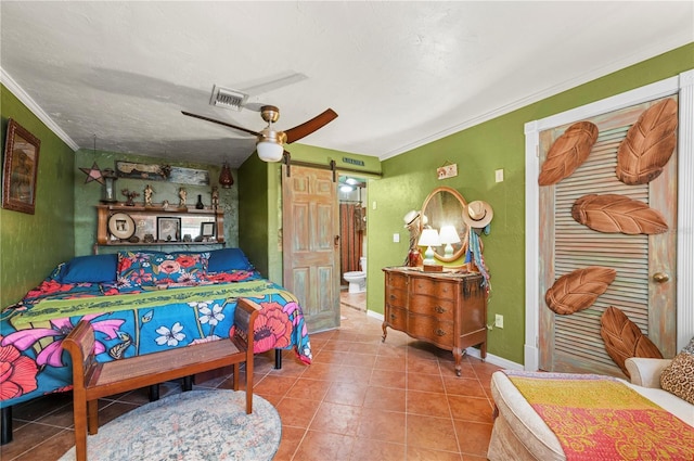 611 Bonita Ct, Punta Gorda, FL 33950 - tiled bedroom featuring ornamental molding, a ceiling fan, baseboards, and connected bathroom