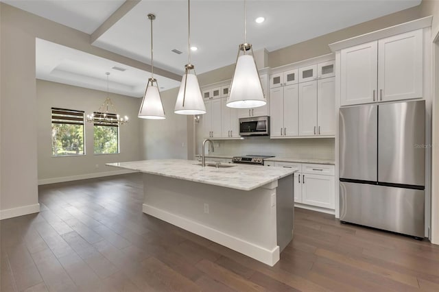 5451 Prime Ter, North Port, FL 34286 - kitchen featuring appliances with stainless steel finishes, baseboards, backsplash, a sink, and white cabinets