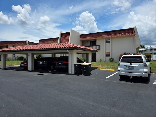 311 Garvin St Unit 405B, Punta Gorda, FL 33950 - view of building exterior featuring uncovered parking