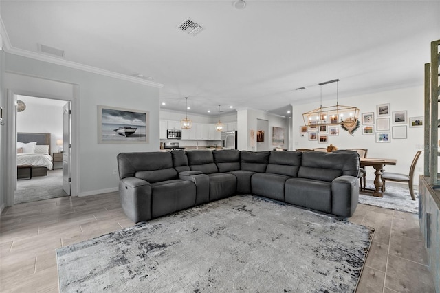 16176 Lotus Way, Punta Gorda, FL 33982 - living area with crown molding, a chandelier, wood finish floors, recessed lighting, and baseboards