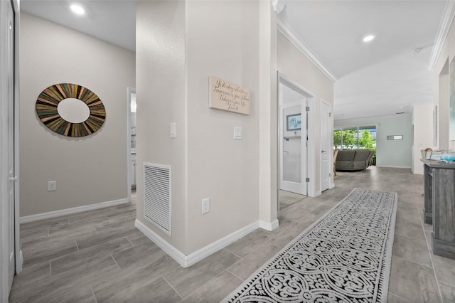 16176 Lotus Way, Punta Gorda, FL 33982 - corridor with ornamental molding, baseboards, and recessed lighting