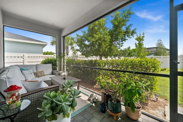 16176 Lotus Way, Punta Gorda, FL 33982 - sunroom / solarium featuring an outdoor hangout area