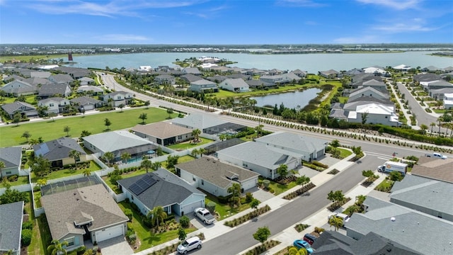 16176 Lotus Way, Punta Gorda, FL 33982 - aerial perspective of suburban area with a large body of water