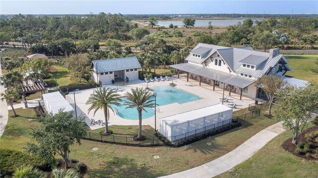 16176 Lotus Way, Punta Gorda, FL 33982 - view from above of property featuring a pool area and a tree filled landscape