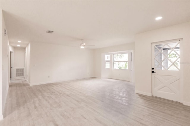 37 Oakland Hills Ct, Rotonda West, FL 33947 - entrance foyer with light wood-style flooring, recessed lighting, ceiling fan, and baseboards