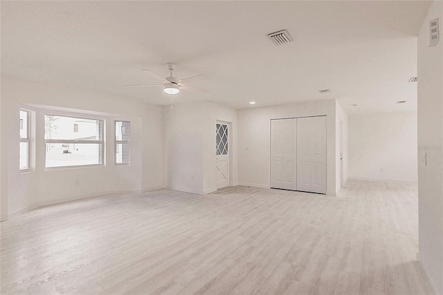 37 Oakland Hills Ct, Rotonda West, FL 33947 - spare room with light wood finished floors, a ceiling fan, and baseboards