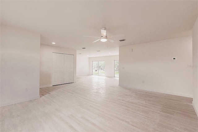 37 Oakland Hills Ct, Rotonda West, FL 33947 - unfurnished room featuring ceiling fan, light wood-style flooring, baseboards, and recessed lighting