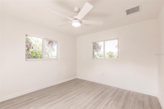 37 Oakland Hills Ct, Rotonda West, FL 33947 - unfurnished room with light wood-type flooring, baseboards, and a ceiling fan