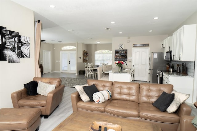 6794 Loffreda Ave, North Port, FL 34291 - living room featuring recessed lighting and light wood-type flooring