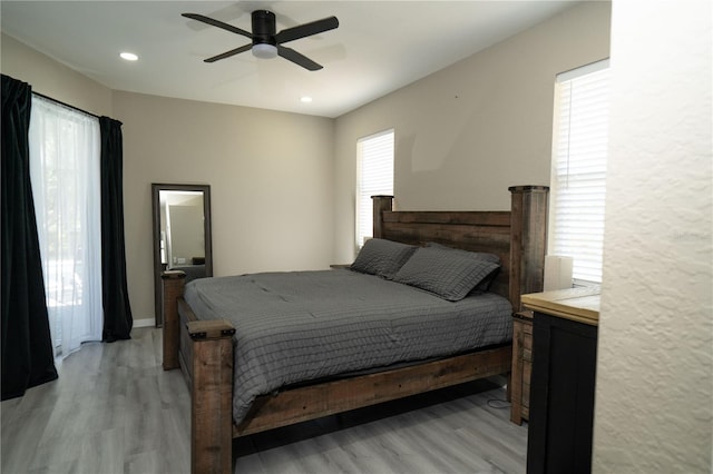 6794 Loffreda Ave, North Port, FL 34291 - bedroom with light wood-style floors, recessed lighting, and a ceiling fan