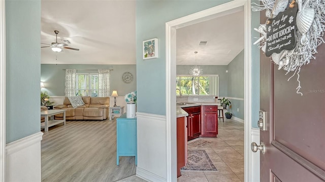 237 Strasburg Dr, Port Charlotte, FL 33954 - entryway featuring a ceiling fan and lofted ceiling
