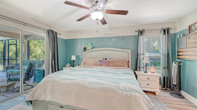237 Strasburg Dr, Port Charlotte, FL 33954 - bedroom featuring access to outside, light wood-style flooring, and ceiling fan