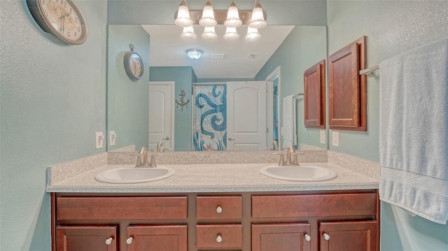 237 Strasburg Dr, Port Charlotte, FL 33954 - full bathroom featuring double vanity and a textured wall