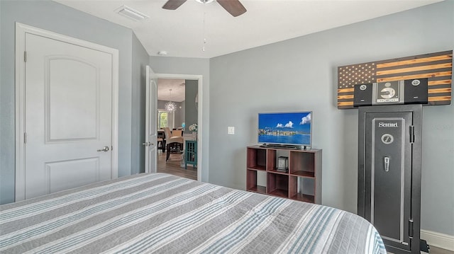 237 Strasburg Dr, Port Charlotte, FL 33954 - bedroom with a ceiling fan and wood finished floors