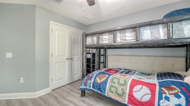 237 Strasburg Dr, Port Charlotte, FL 33954 - bedroom featuring wood finished floors, a closet, and a ceiling fan